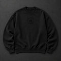 The Possibility Crewneck laid flat on a charcoal surface